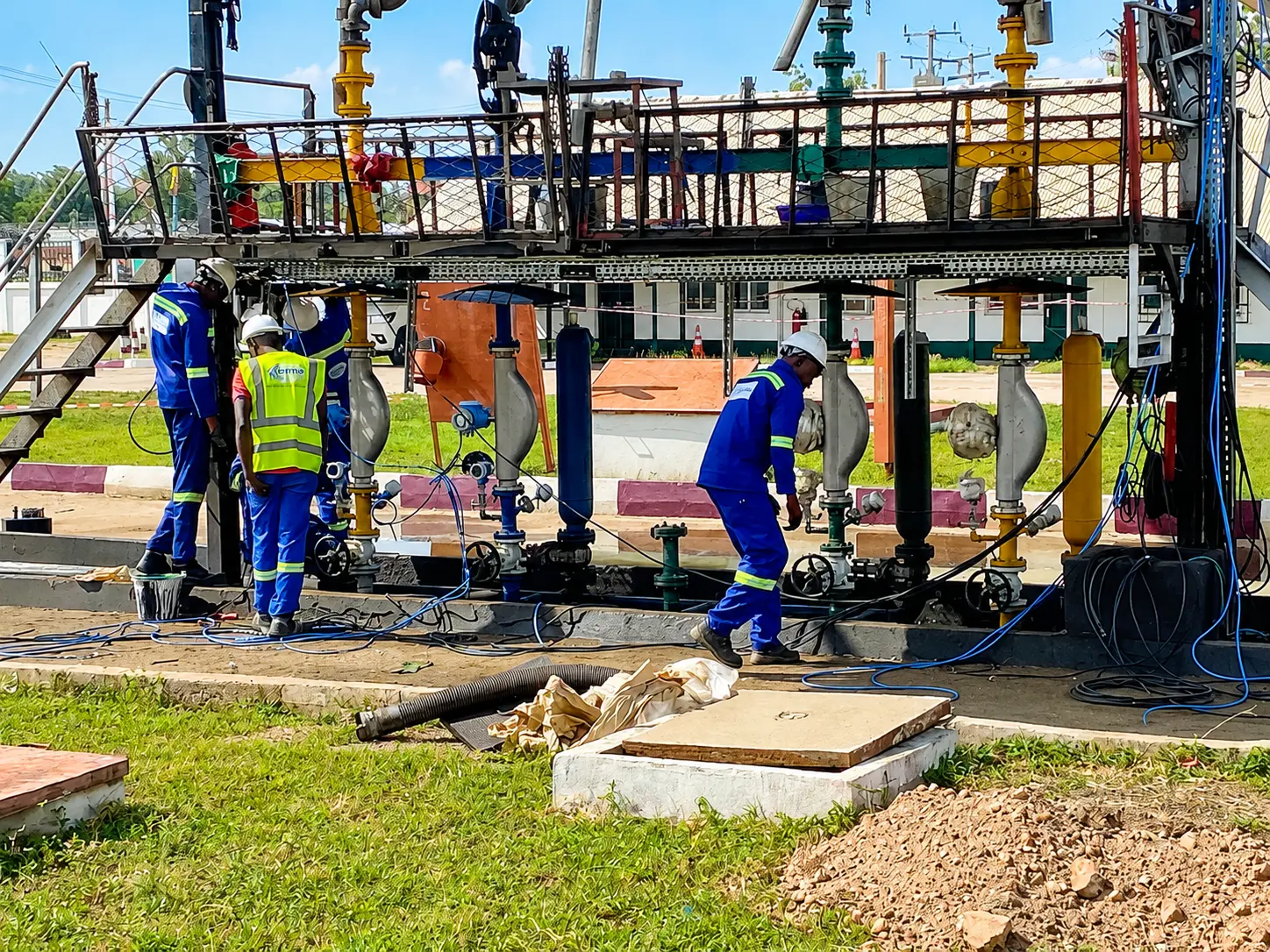 ISAS team installing flow and pressure measurement instruments on a metering skid